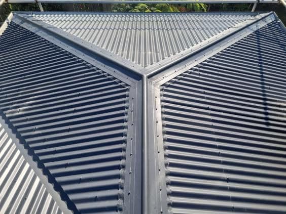 Fresh grey corrugate hip roof detail